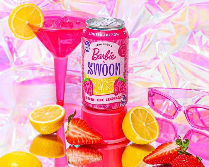 A pink beverage can featuring lemons and strawberries