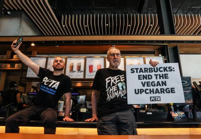 Actor James Cromwell protests at a Starbucks in NYC