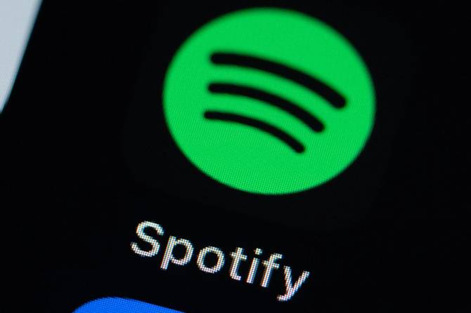 Image of spotify logo on an iPhone screen