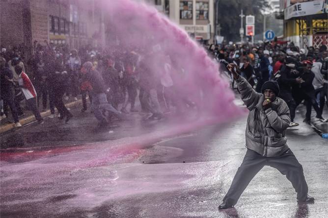 Police spray protesters in Kenya with a water canon