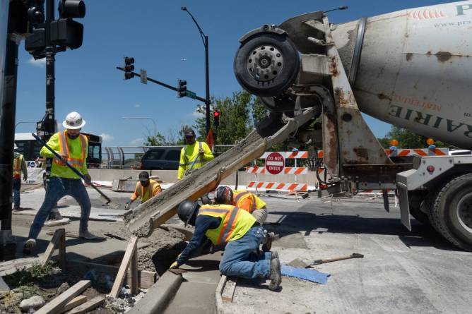 workers pour cement