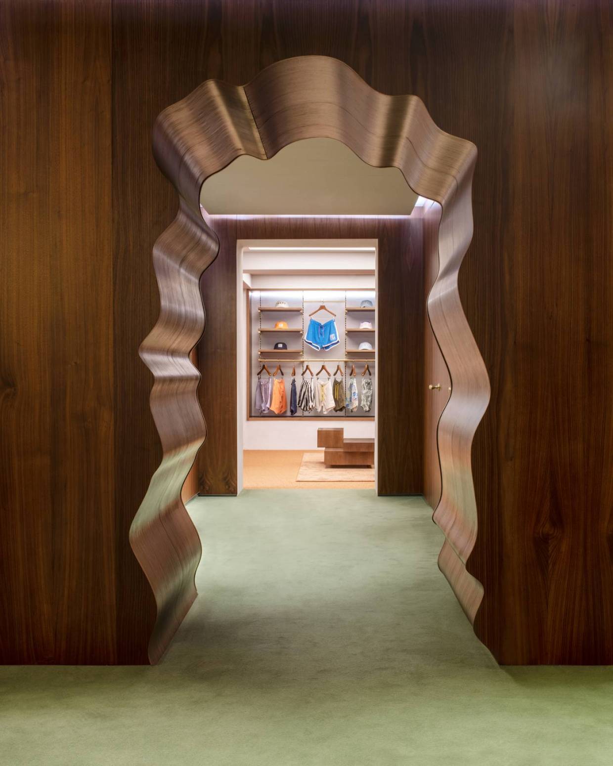 The irregularly shaped portals between rooms at the Gant flagship store in Stockholm. 
