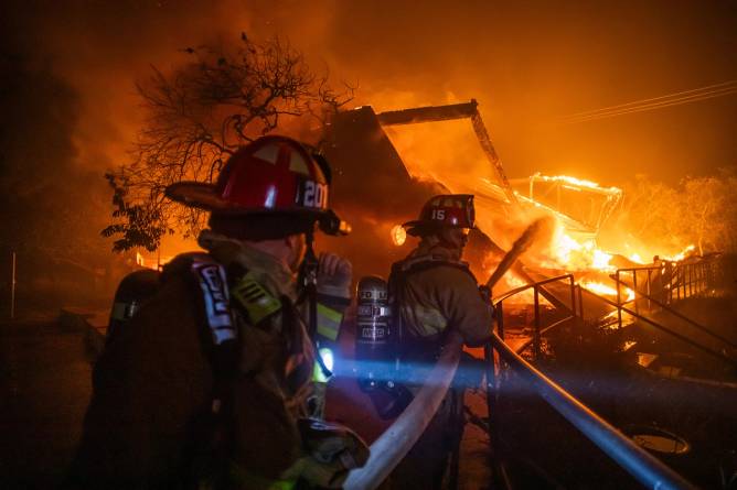 Firefighters fighting LA County fire