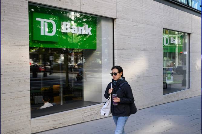 Person walks past TD Bank