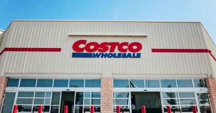 The outside of a Costco storefront on sunny day