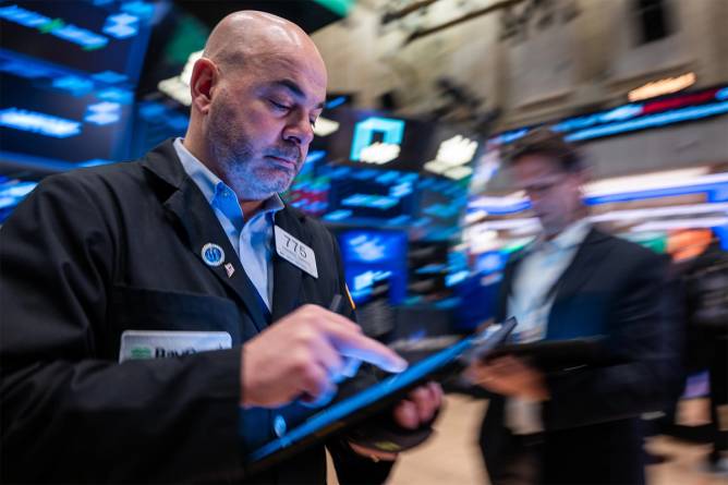 Stock trader on NYSE floor