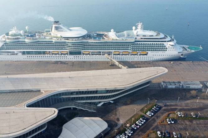 Giant cruise ship at port.