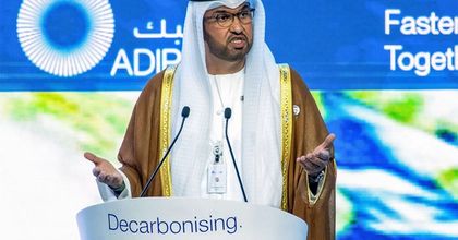 President Sultan Al Jaber speaking on stage at COP28