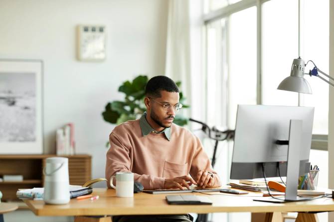 Man using computer at home office