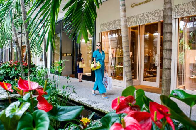 Woman walking around Bal Harbour Shops