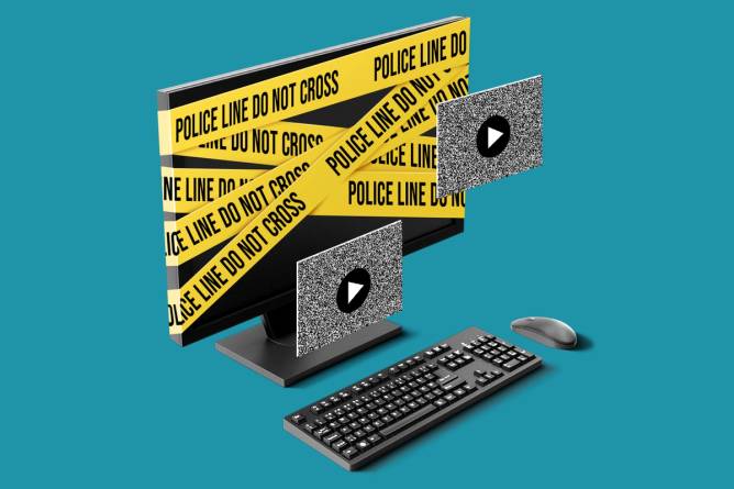 Police crime scene tape wrapped around a computer monitor