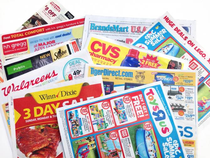 A collage of newspaper circulars.