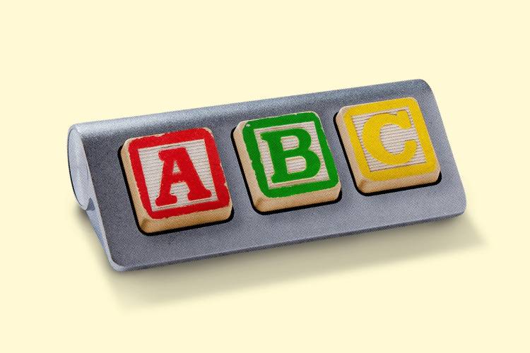 Childcare and work. Keyboard with children's alphabet blocks.