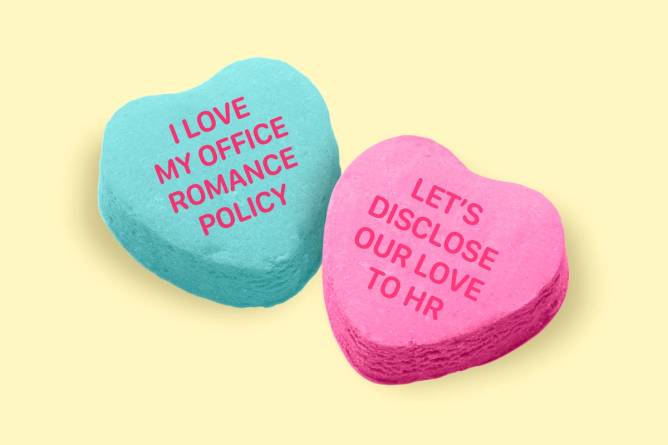 Candy hearts with writing about workplace romance policies