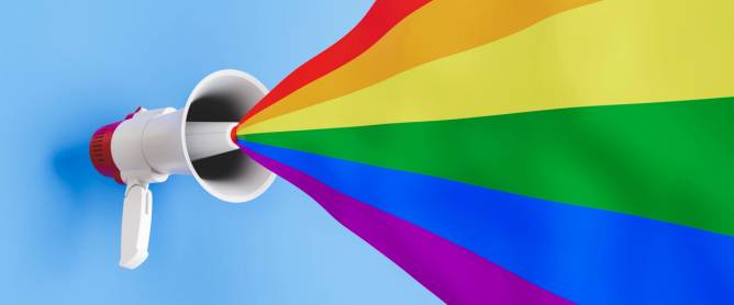 A graphic illustration of a megaphone with the colors of the Pride flag emanating from it.