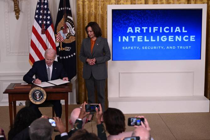 Biden signing an executive order on AI last fall