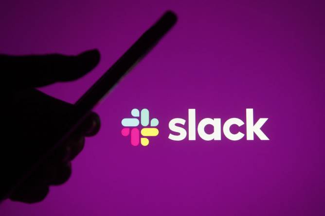 Phone silhouette in front of Slack icon