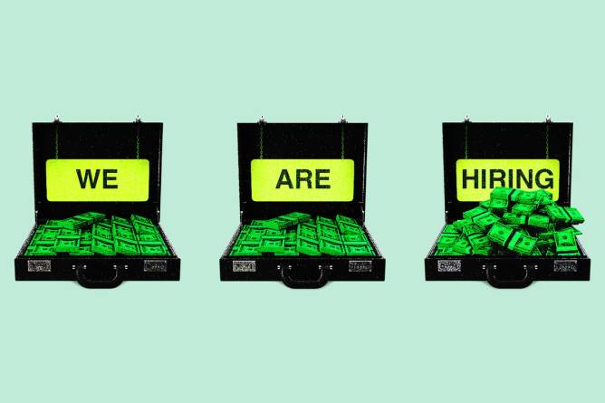 Stacks of money inside briefcases with a "we are hiring" sign attached. Credit: Anna Kim