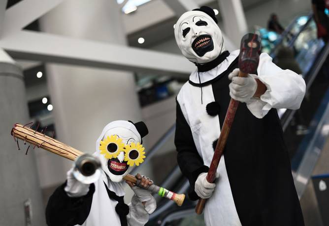 Cosplayers dressed as Art the Clown from Terrifier