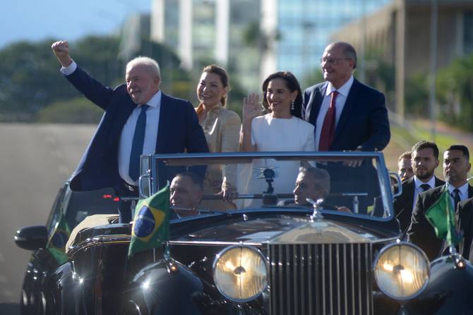 President of Brazil Luiz Inacio Lula da Silva greets supporters