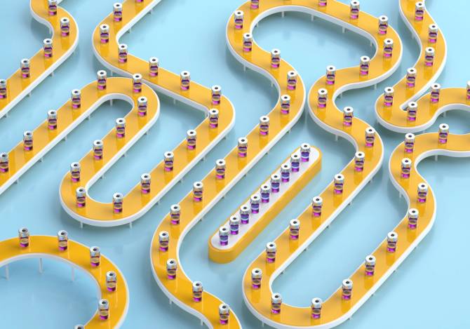 Pill bottles on a yellow conveyer belt