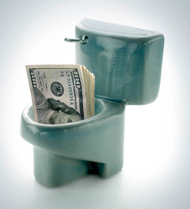 Hundred dollar bills poking out of a toilet bowl