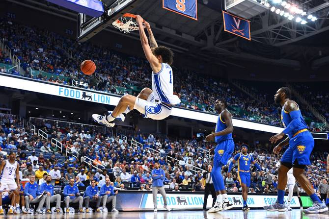 Dereck Lively II #1 of the Duke Blue Devils dunks against the Pittsburgh Panthers during the first half of their game