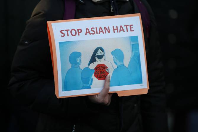 Asian Americans and New Yorkers are gathered for a peace vigil for Atlanta Spa shooting victims of Asian hate at the Union Square in New York City