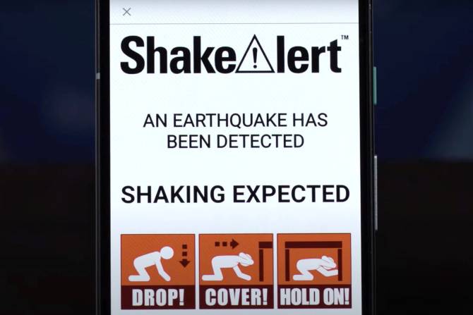 A phone displaying a MyShake earthquake alert