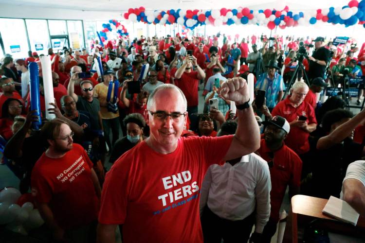 United Automobile Workers (UAW) President Shawn Fain speaks as UAW members and their supporters gather for Solidarity Sunday at the UAW Region 1 office in Warren, Michigan, on August 20, 2023. 