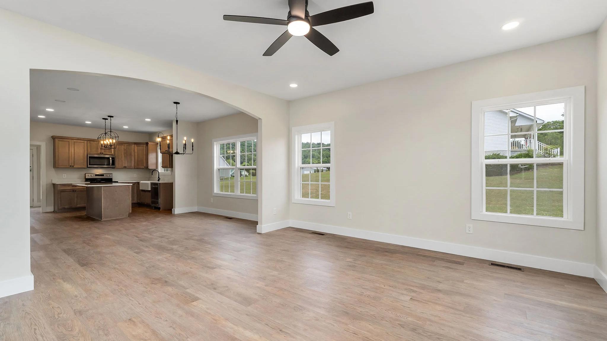 Inside of home looking into kitchen area from living room