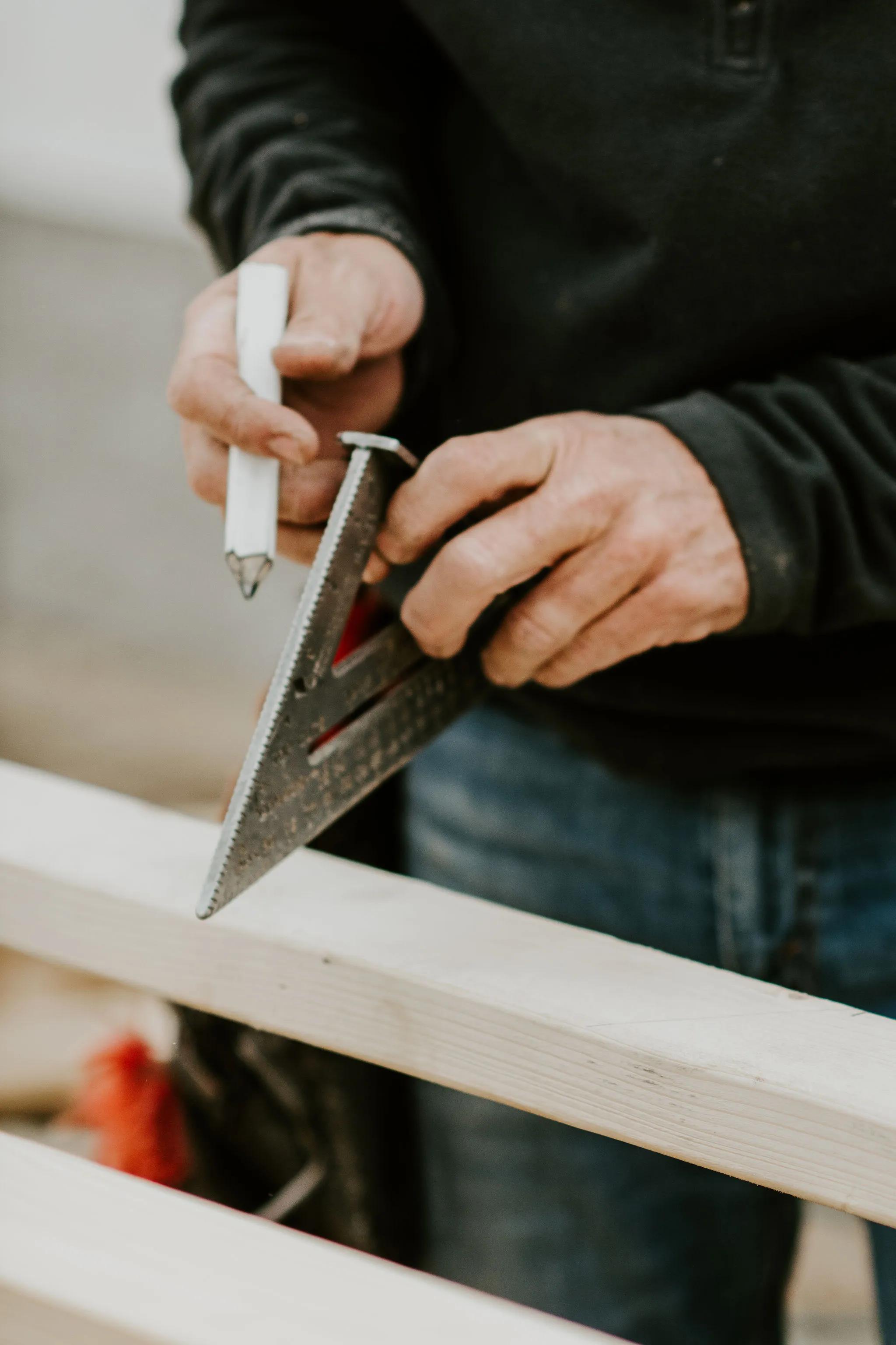 Man measuring wood
