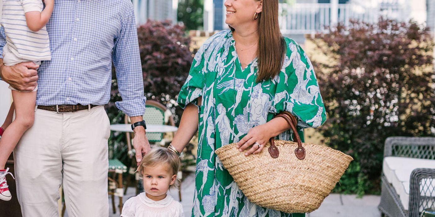 Family walking through Cannonborough-Elliotborough neighborhood in Charleston SC