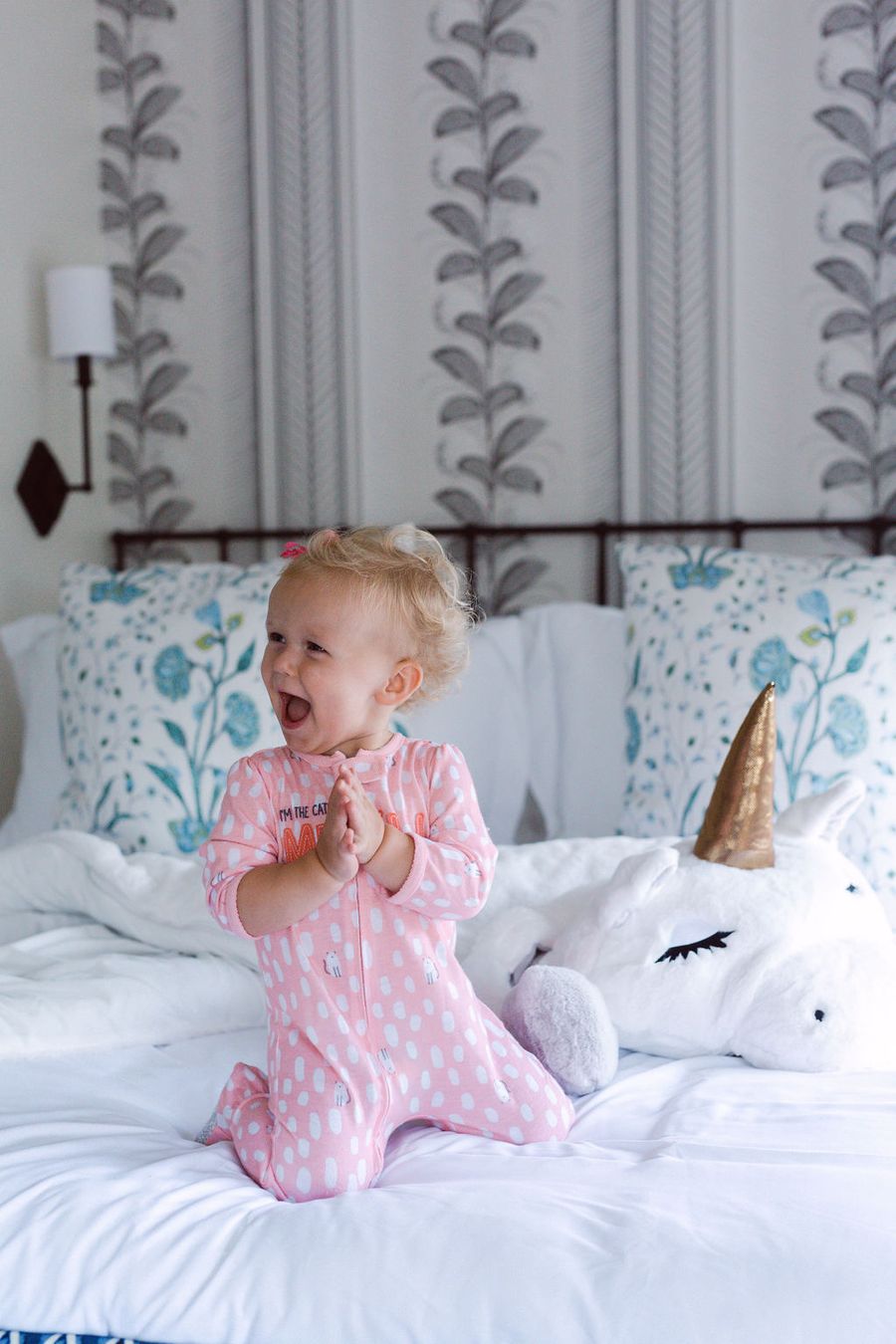 Kid-friendly Charleston luxury vacation rental bedroom with cozy bedding and family-focused design by Respite & Revelry Co.