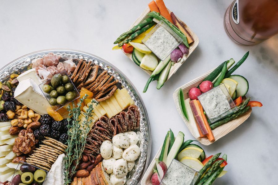 Curated grazing spread and charcuterie arranged for guests at a Respite and Revelry vacation rental in Charleston SC