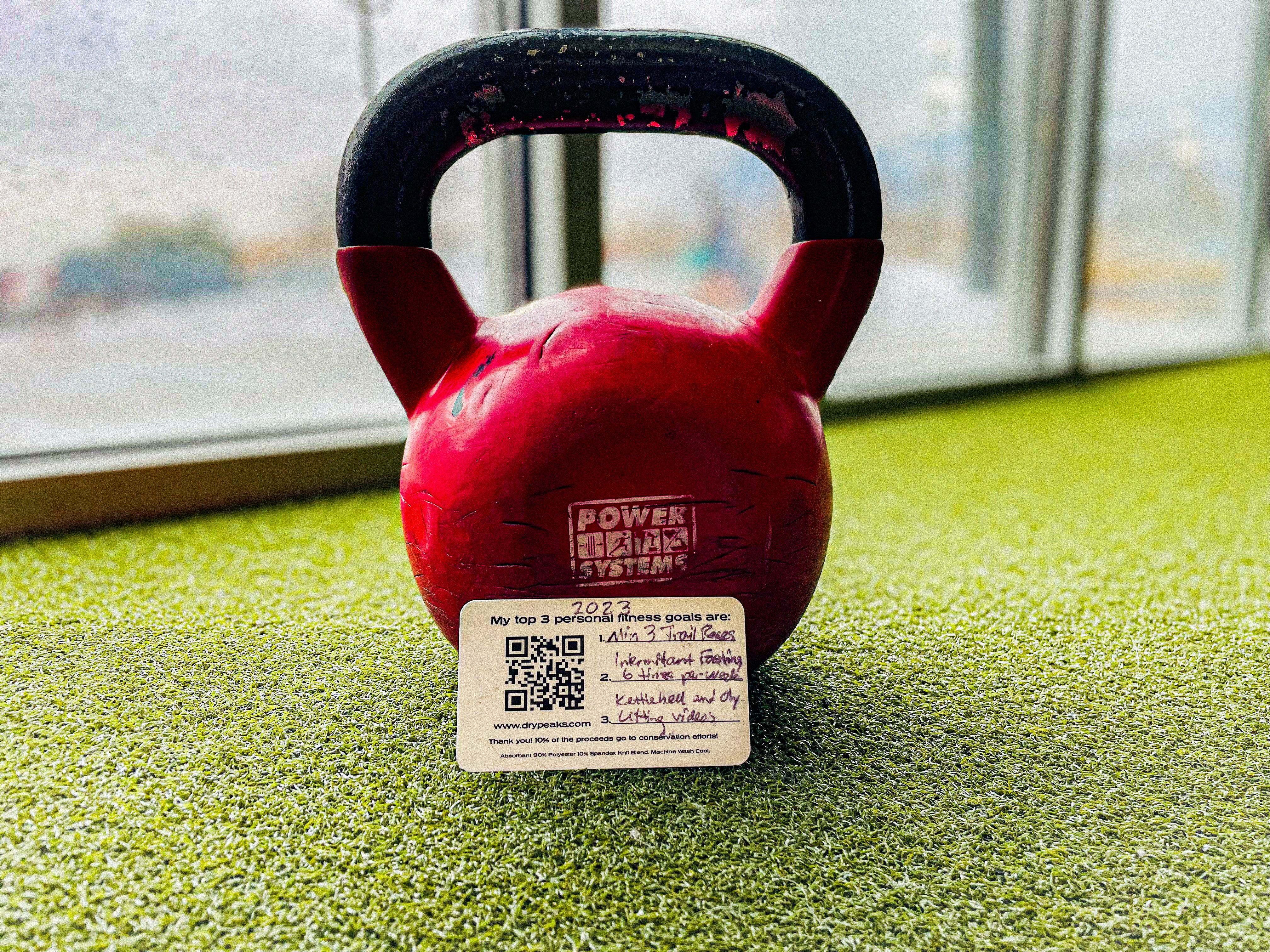 Kettlebell and Dry Peaks hang tag / goal card by Clark Newell