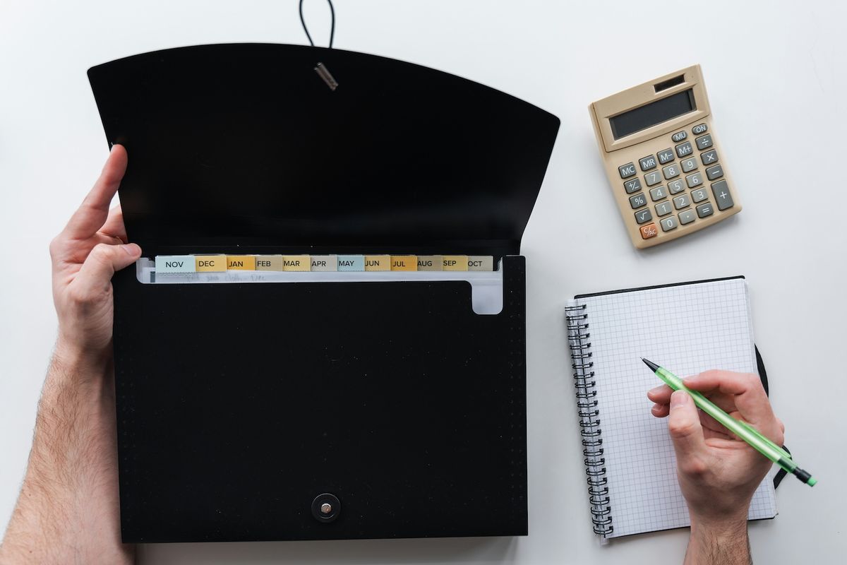 Organized small business tax documents and IRS forms