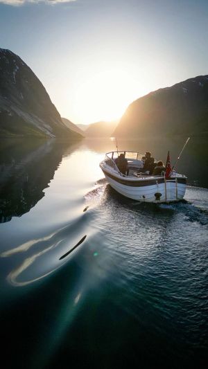 The Skager boat on Lake Jølstravatnet at sunset