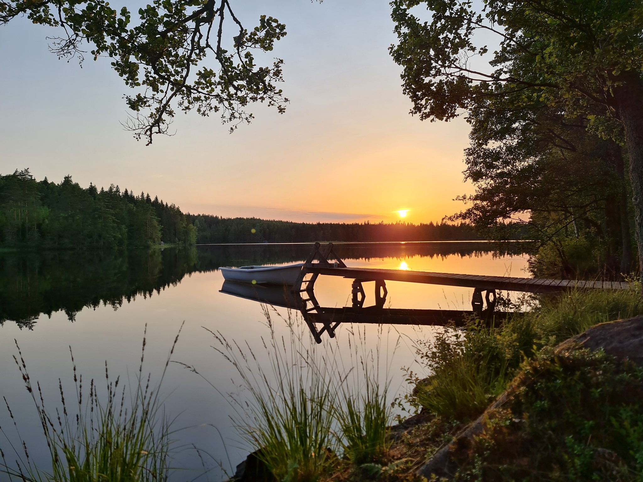 Brygga i solnedgång