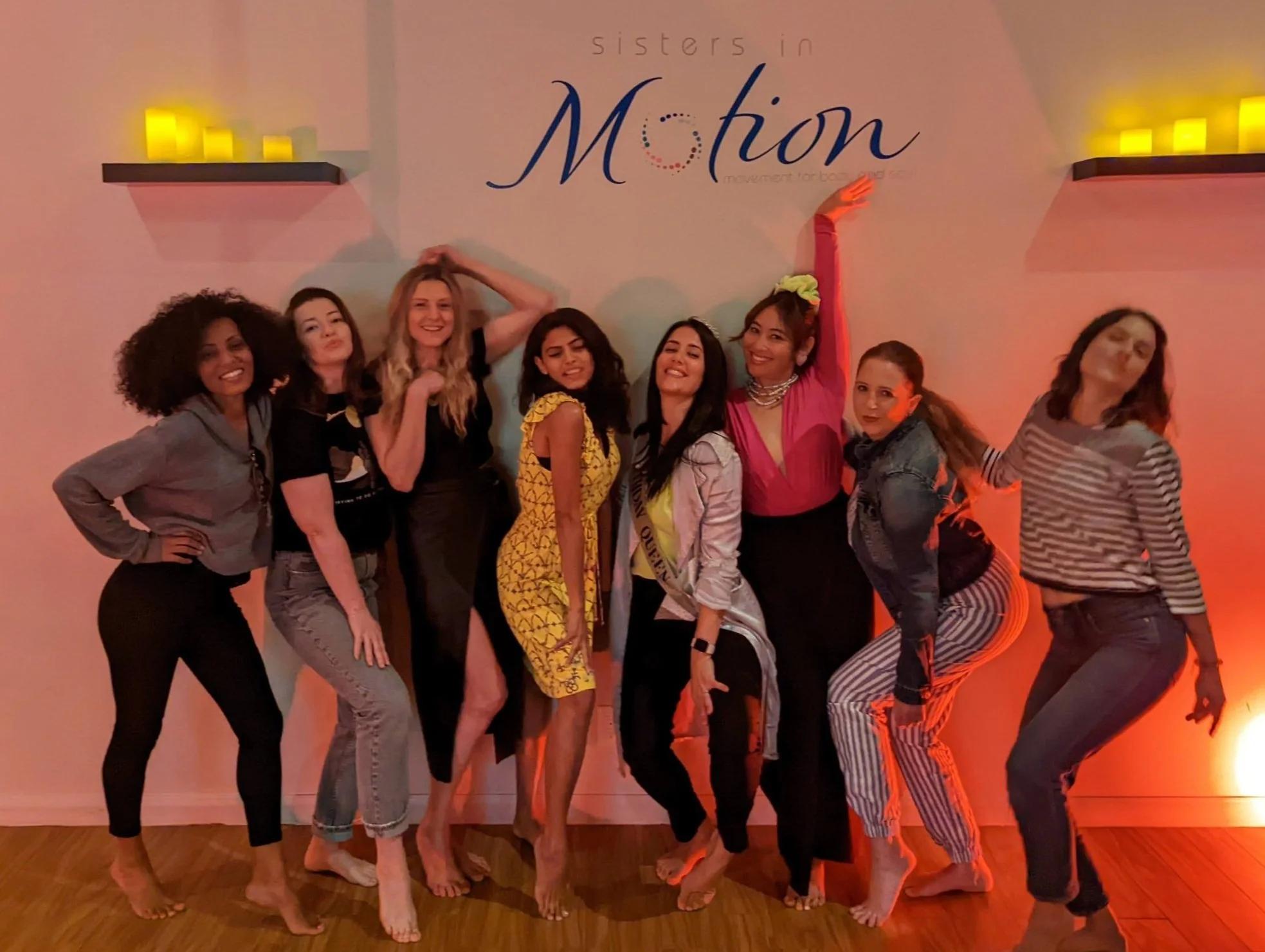 Women celebrating together in the studio