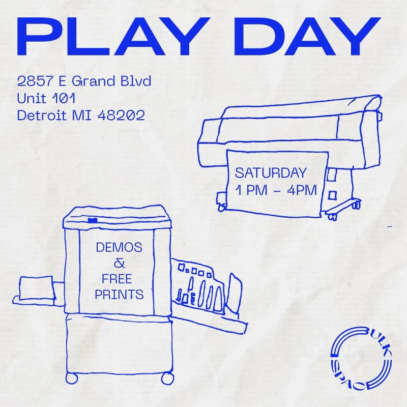 a blue drawing of a printer and a sign that says play day