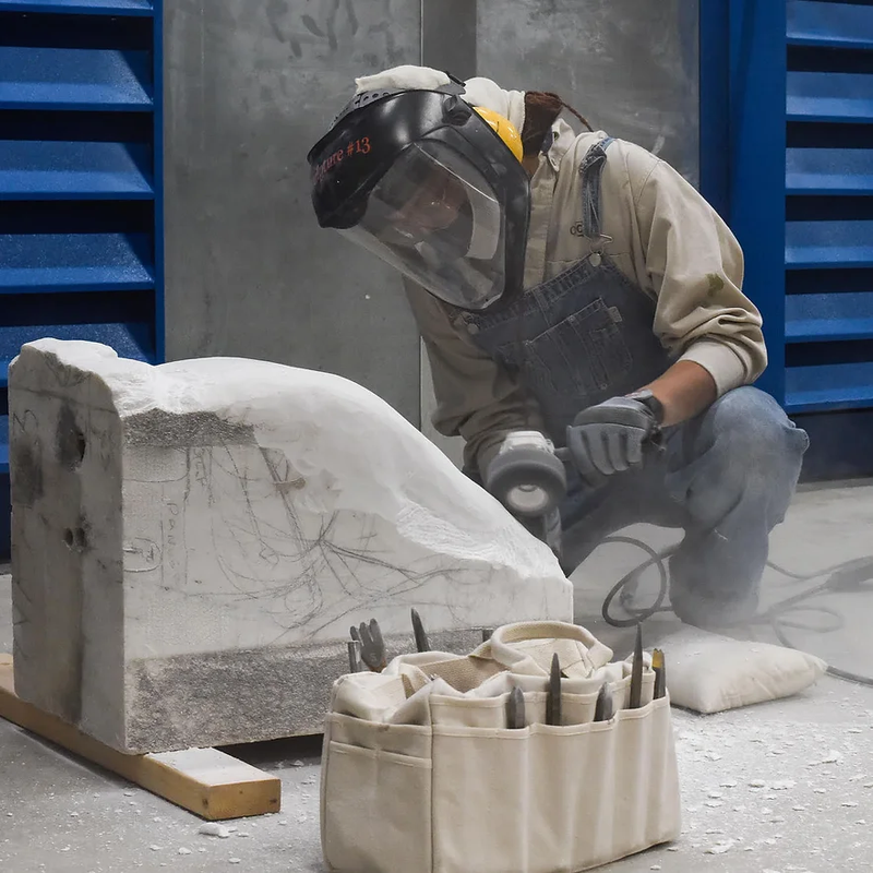 a man wearing a mask with the number 13 on it