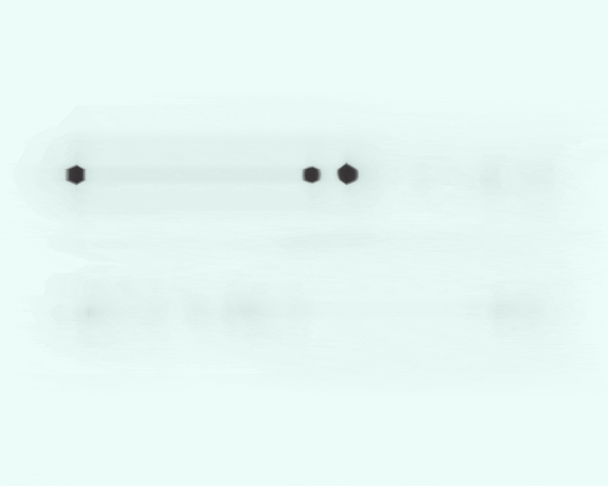 a white background with a few black dots on it