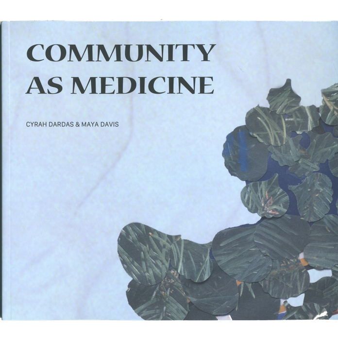 Book cover for "COMMUNITY AS MEDICINE" by Cyrah Dardas & Maya Davis, with a light blue background and a collage of dark green botanical shapes.