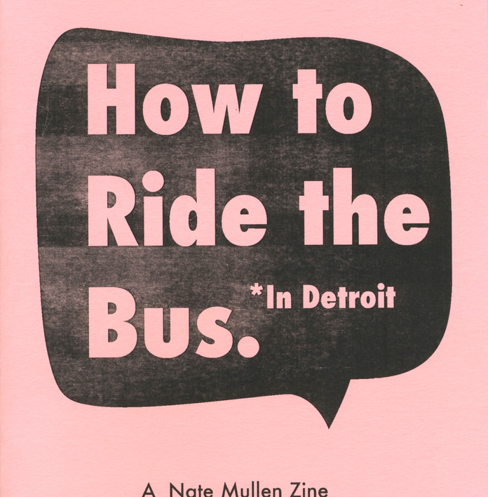 Pink zine cover titled "How to Ride the Bus. *In Detroit" inside a black speech bubble, by Nate Mullen.