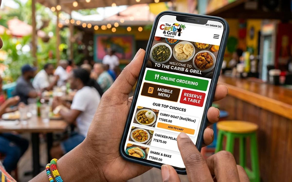 Trinidad restaurant website on a smartphone showing a mobile menu, online ordering, and a table booking button
