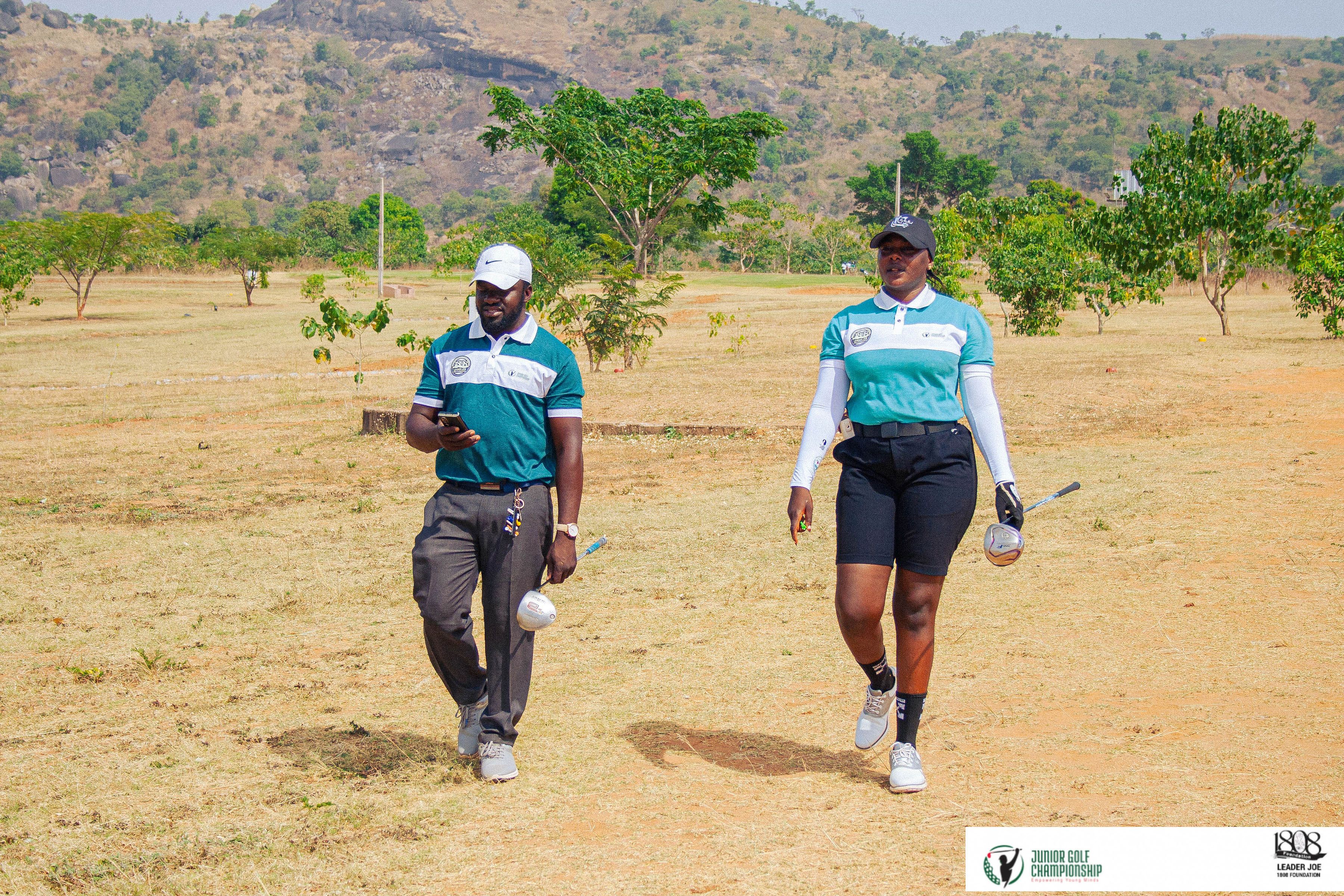 Male and female golfer