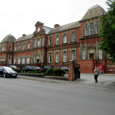 Large old building on a street, Headland Archaeology Yorkshire and North office.
