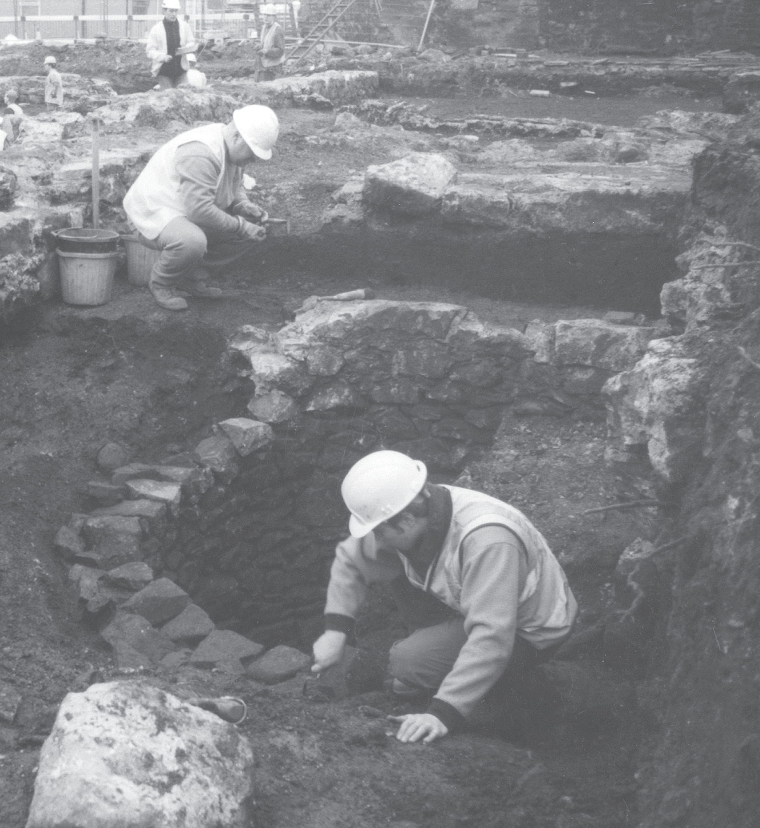 Cleaned stone wall foundations with scales