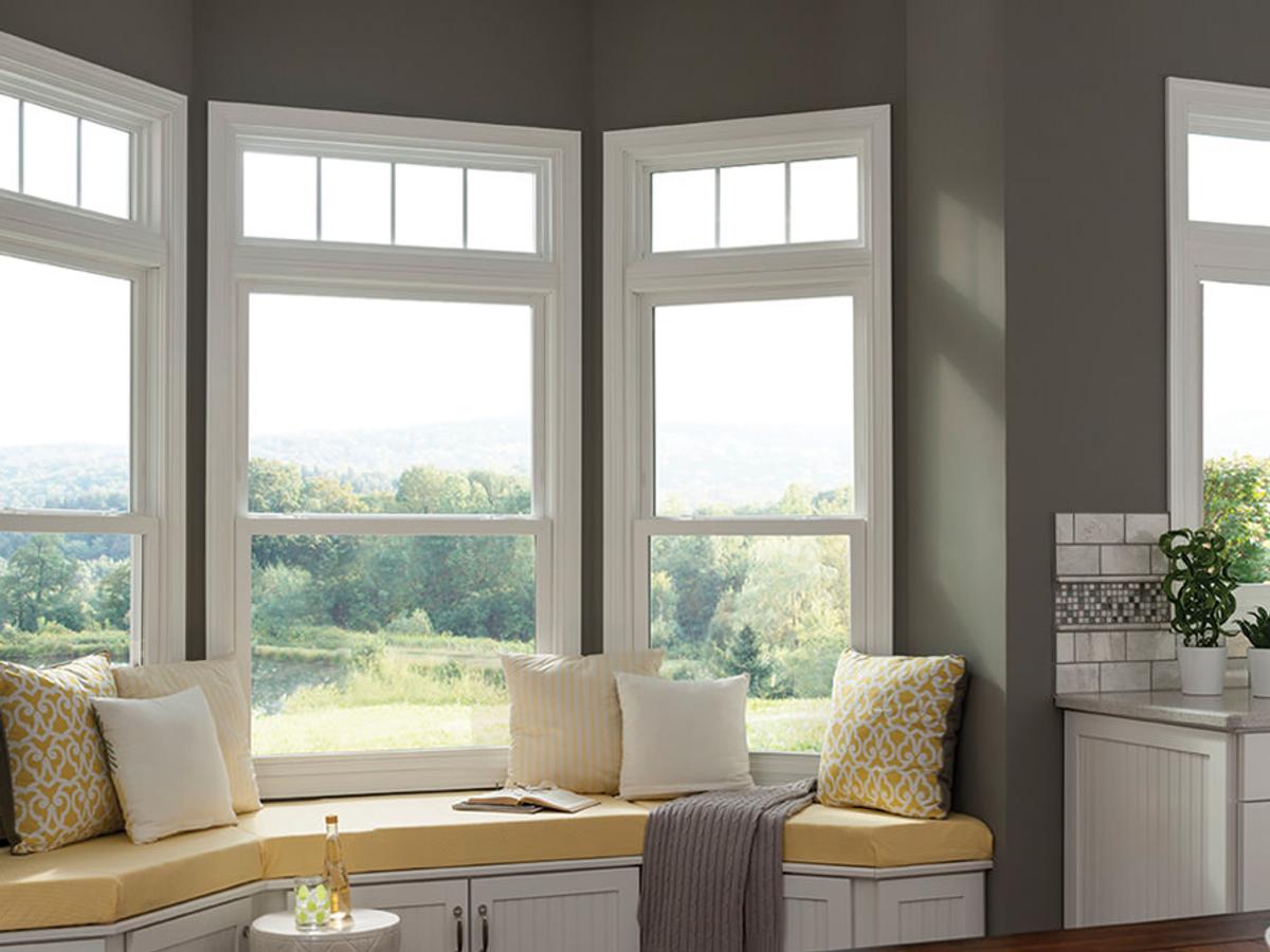 Light-filled interior showing replacement-window styles